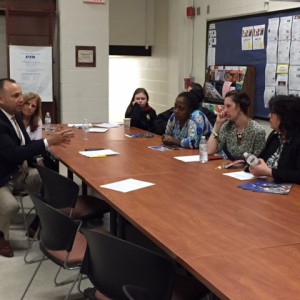 Representative Cuevas at West Side Middle School meeting wtih parents, students and staff