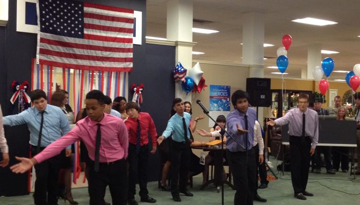 West Side School patriotic celebration, students singing