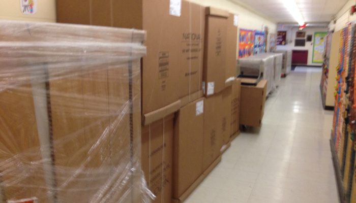 Boxes of equipment - The Insalco team gets the O'Brien Family Resource Center set up