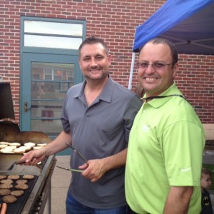 Multicultural Night at John Barry Elementary School- the staff cooks for families, Assistant Principal Daniel Crispino and Family Liaison, David Cardona