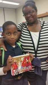 CommPACT supports innovative Bassick High School Parent/Student/Family Book Club The Bassick Book Club encourages parent Dione to read with her son, Tione 